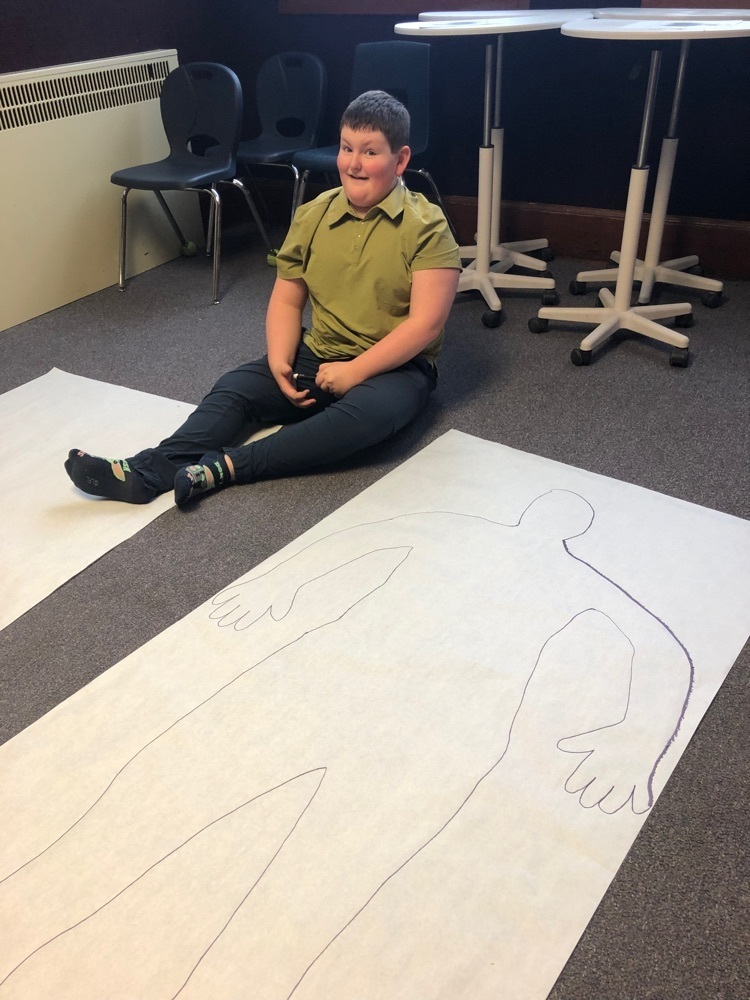 JT is surveying the outline of his body.